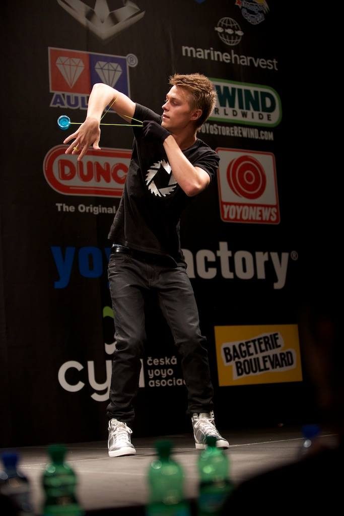 Gentry Stein performing on stage at the World Yo-Yo Contest with a wide competition yo-yo